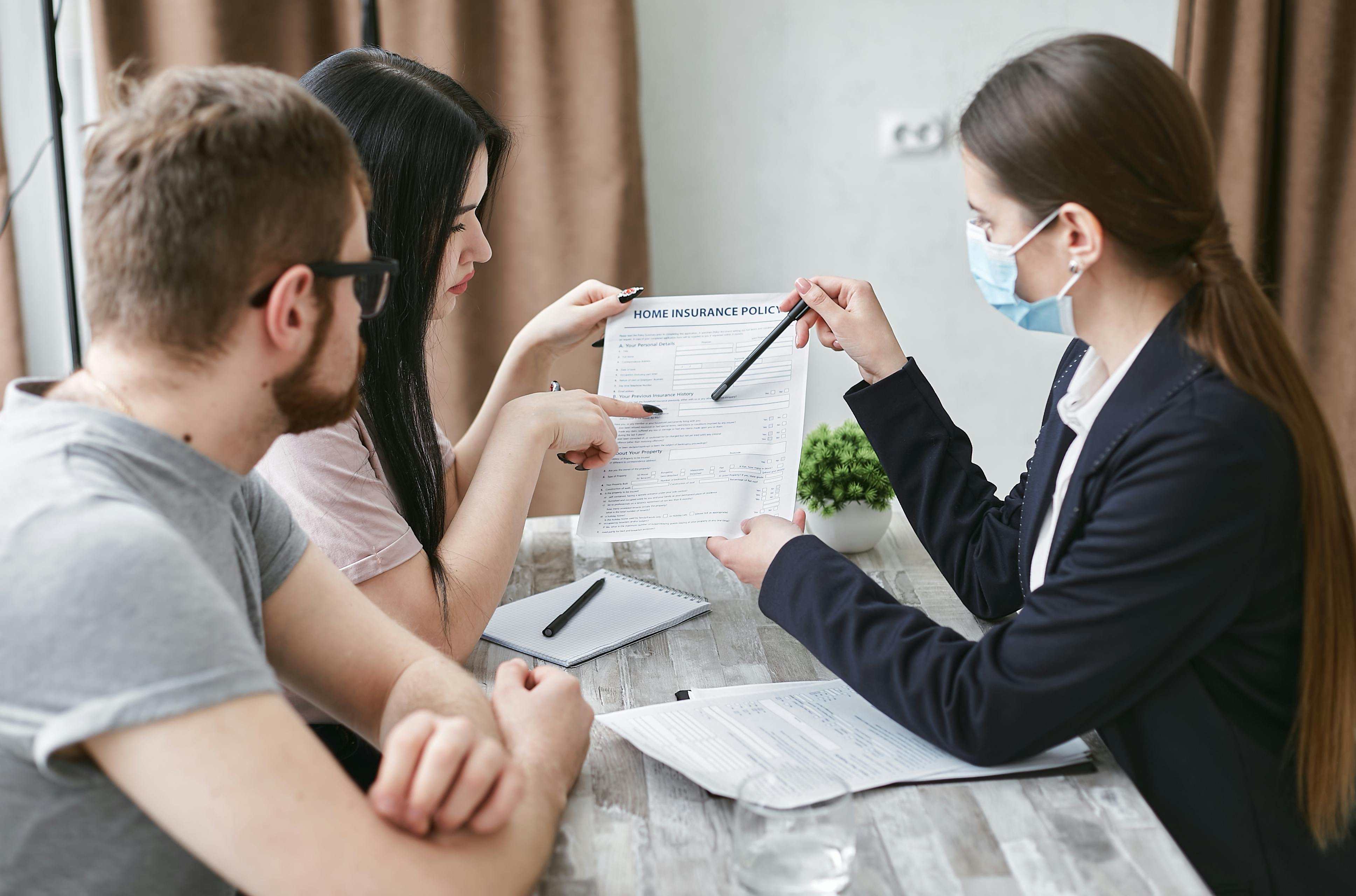 Insurance advisor discussing liability coverage options